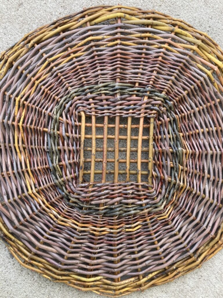 irish style basket base with open center and swirl design
