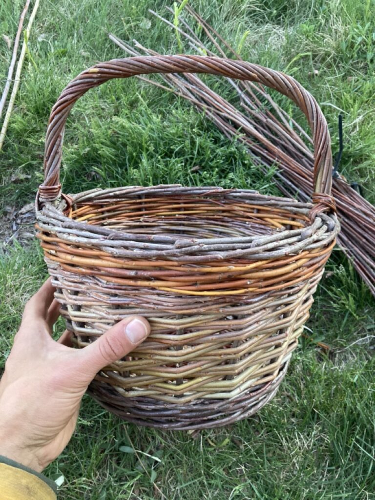 small round willow basket with short handle